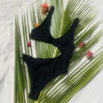 Stylish Morgan one-piece swimsuit in black with high-waisted bottom and adjustable ties.