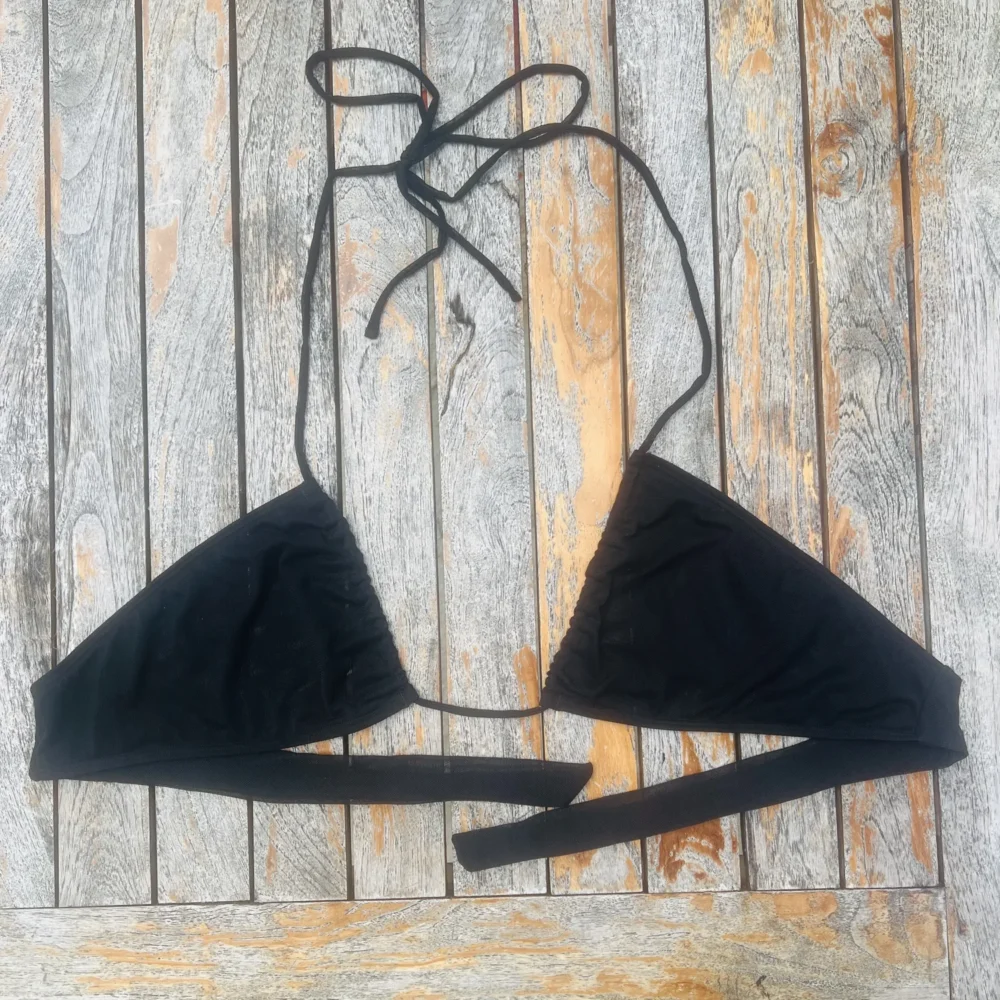 Black Avery halter triangle bikini top with adjustable ties.