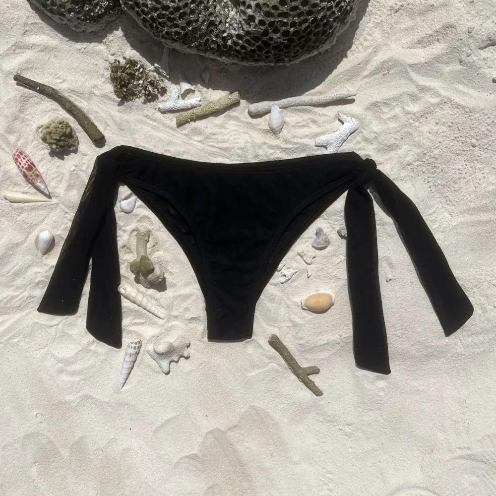 Chic black Jordan Bottom bikini with adjustable ties and mid-rise design.