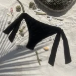 Chic black Jordan Bottom swimwear with adjustable ties for a flattering fit.