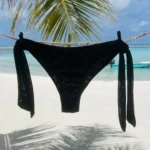 Chic black Jordan Bottom bikini with adjustable ties for perfect fit and comfort.