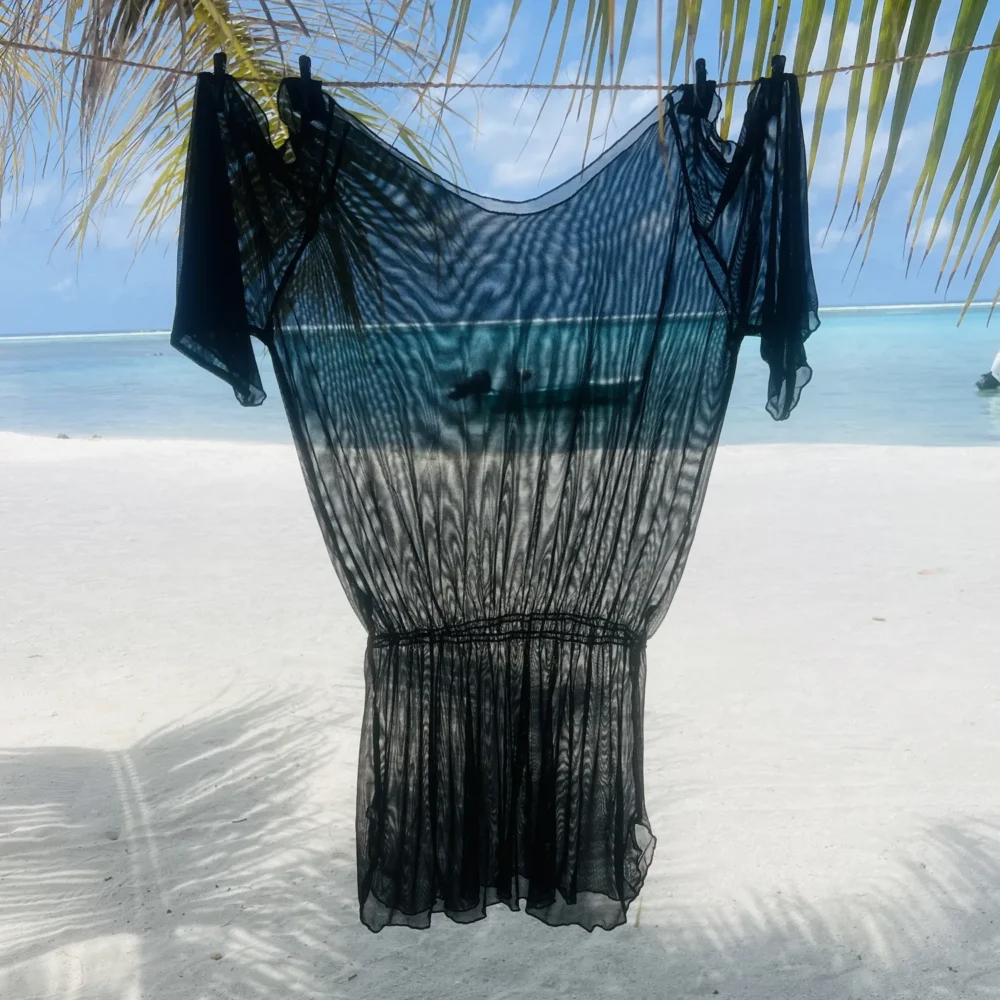 Stylish Kendall Short Kaftan Cover Up in breathable black fabric for summer beachwear.