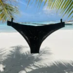 Black Taylor Bottom swimwear offering shaping support and cheeky coverage.