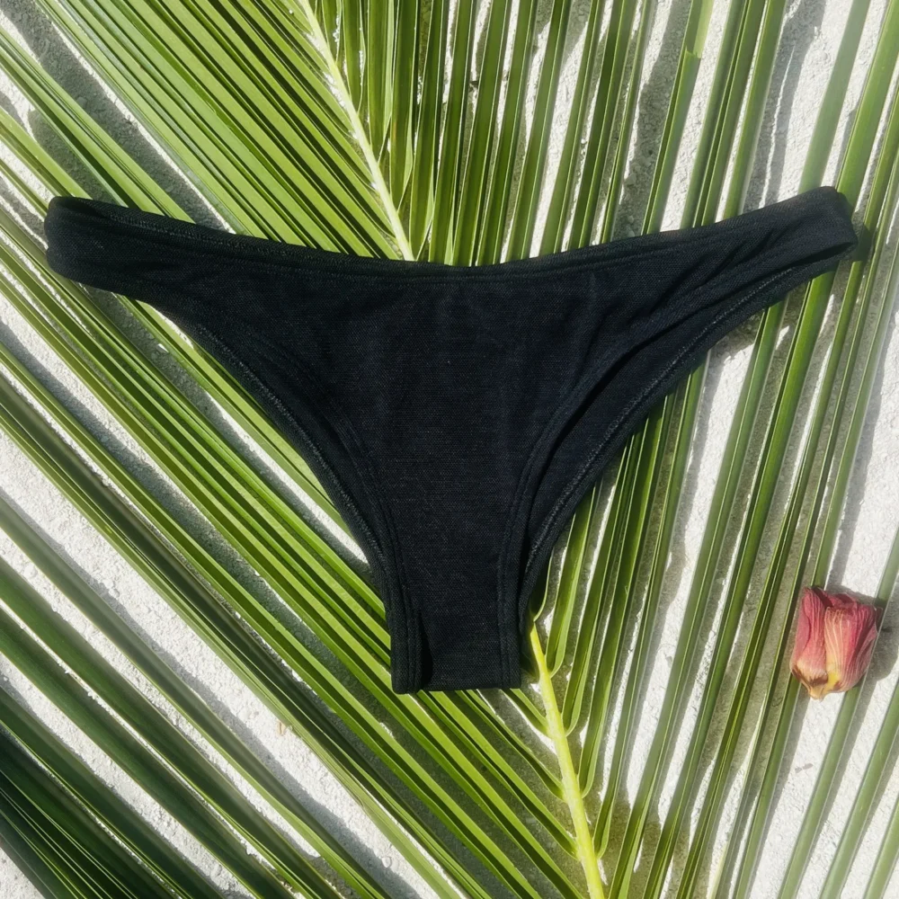 Black Taylor Bottom swimwear offering mid-rise fit and cheeky coverage.