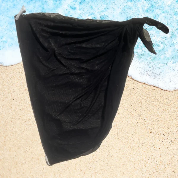 Chic black Taylor Short Tie Side Sarong Cover Up with semi-sheer finish.